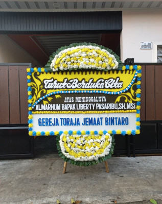 Papan Bunga Duka di Jago